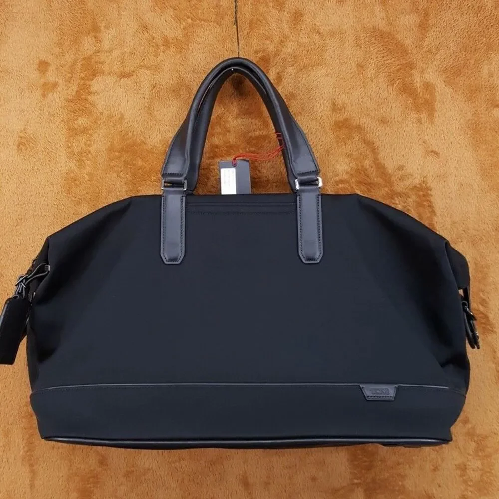 TUMI Nelson Harrison Duffle In Black Crossbody Strap $675